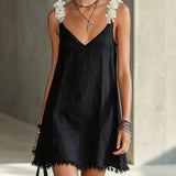 Black Mini Dress with V-Neck and White Flowers