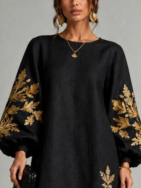 Black Mini Dress with Lantern Sleeves and Gold Pattern